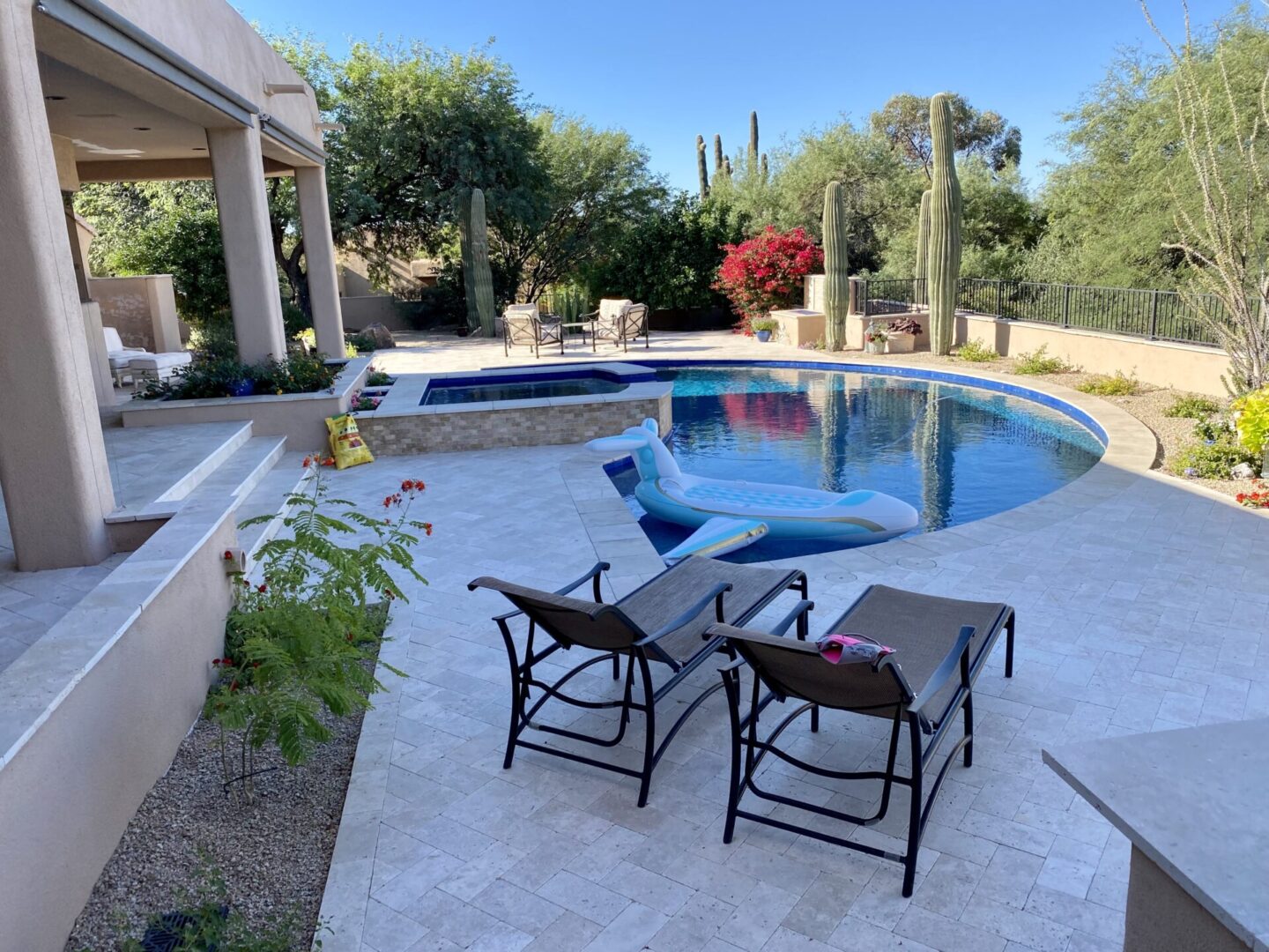 Travertine pool deck installed by Big Nick's Landscaping